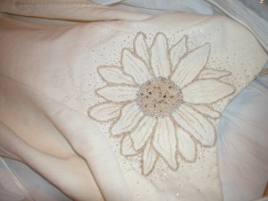 Crystal fitting flower earth-friendly gown made of hemp and cotton that was created by Tara Lynn