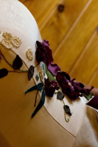 Tara Lynn uses remnants of hemp, silk and vintage fabric scraps to create a mélange of poppies on this elegant eco-friendly wedding gown.